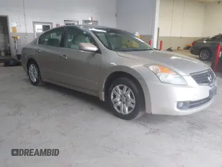 2009 Nissan Altima S z VIN 1N4AL21EX9N482418, wystawiony jako IAAI lot #42040370 z przebiegiem 160 508 mil mil oraz . Historia ofert i sprzedaży dostępna na DreamBid. Obrazek 1.