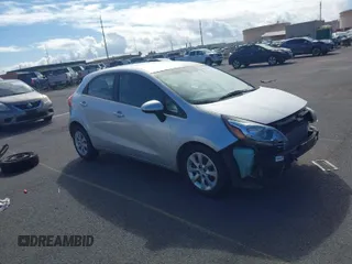 2012 Kia Rio LX with VIN KNADM5A34C6067453, listed as a IAAI auction lot 41489743 with 57,426 mi miles. Bid and sale history available at carsss.com. Image 1.