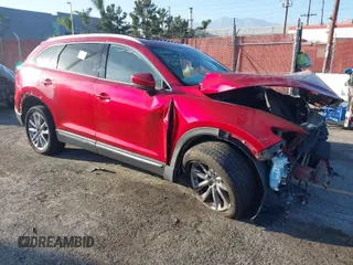 2021 Mazda CX-9 Carbon Edition with VIN JM3TCBDY7M0513131, listed as a IAAI auction lot 41647319 with Not provided miles and . Bid and sale history available at DreamBid. Image 1.