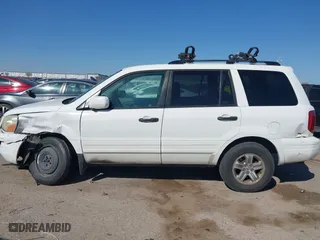 2005 Honda Pilot EX-L with NAVI with VIN 2HKYF18775H571312, listed as a IAAI auction lot 41830609 with 297,923 mi miles. Bid and sale history available at carsss.com. Image 14.