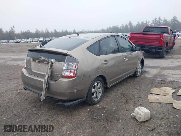 2005 Toyota Prius z VIN JTDKB20U553015603, wystawiony jako IAAI lot #41753696 z przebiegiem 299 999 mil mil oraz . Historia ofert i sprzedaży dostępna na DreamBid. Obrazek 4.