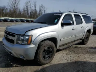 2012 Chevrolet Suburban LT with VIN 1GNSKJE77CR123767, listed as a Copart auction lot 48902935 with 201,007 mi miles and Salvage Title. Bid and sale history available at carsss.com. Image 1.