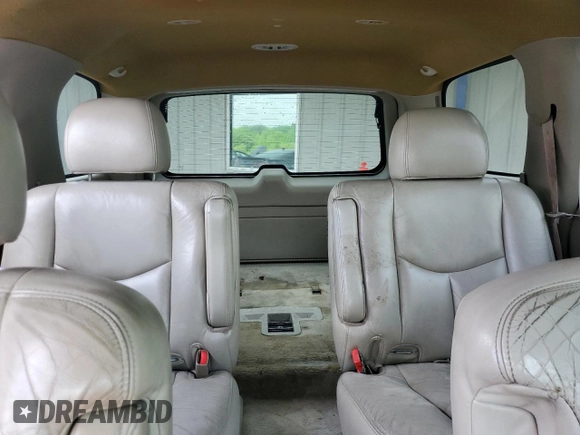 2004 GMC Yukon SLT z VIN 1GKEC13ZX4R203707, wystawiony jako Copart lot #56866075 z przebiegiem Nie podano mil oraz Szkoda całkowita • Salvage title. Historia ofert i sprzedaży dostępna na DreamBid. Obrazek 10.