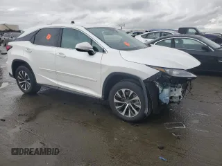 2022 Lexus RX 350 with VIN 2T2AZMDA5NC336823, listed as a Copart auction lot 86950954 with 38,959 mi miles and Salvage title. Bid and sale history available at DreamBid. Image 4.