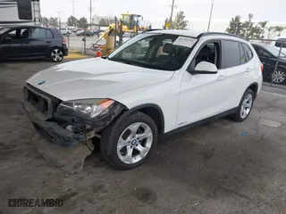2015 BMW X1 sDrive28i with VIN WBAVM1C53FV318663, listed as a IAAI auction lot 41711526 with 182,204 mi miles. Bid and sale history available at carsss.com. Image 17.