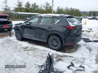 2019 Mazda CX-5 Sport with VIN JM3KFBBM8K1621929, listed as a IAAI auction lot 41356228 with 67,023 mi miles and . Bid and sale history available at DreamBid. Image 3.