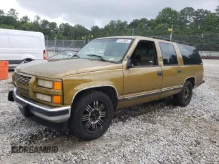 1999 Chevrolet Suburban with VIN 1GNEC16R4XJ483612, listed as a Copart auction lot 61125605 with 328,072 mi miles and Salvage title. Bid and sale history available at DreamBid. Image 1.