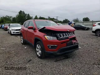 2019 Jeep Compass Latitude with VIN 3C4NJDBB7KT735802, listed as a Copart auction lot 57726275 with 58,660 mi miles and Salvage title. Bid and sale history available at DreamBid. Image 14.