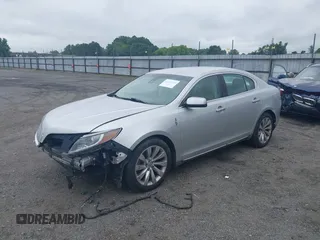 2013 Lincoln MKS с VIN 1LNHL9DK3DG604712, выставлен на аукционе IAAI как лот 42351237 с пробегом 144 927 миль миль и . История ставок и продаж доступна на DreamBid. Изображение 2.