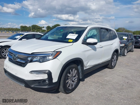2021 Honda Pilot EX-L with VIN 5FNYF5H55MB039589, listed as a IAAI auction lot 41694567 with 58,685 mi miles. Bid and sale history available at carsss.com. Image 17.