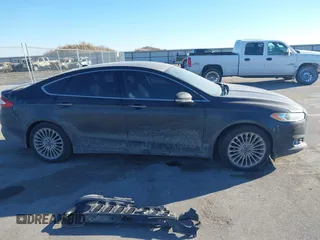 2014 Ford Fusion Titanium with VIN 3FA6P0K93ER293357, listed as a IAAI auction lot 41354955 with 176,130 mi miles. Bid and sale history available at carsss.com. Image 13.