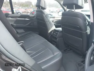 2014 BMW X5 xDrive35i with VIN 5UXKR0C57E0H20944, listed as a IAAI auction lot 42011451 with 208,205 mi miles. Bid and sale history available at carsss.com. Image 8.