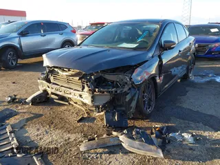 2015 Ford Focus SE with VIN 1FADP3F29FL384879, listed as a IAAI auction lot 41335839 with 107,871 mi miles. Bid and sale history available at carsss.com. Image 6.