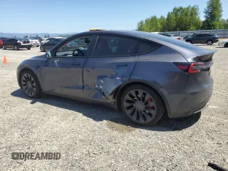 2022 Tesla Model Y Performance with VIN 7SAYGDEF3NF384161, listed as a Copart auction lot 59989145 with 12,731 mi miles and Salvage title. Bid and sale history available at DreamBid. Image 2.