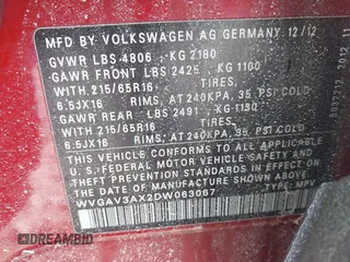 2013 Volkswagen Tiguan S with VIN WVGAV3AX2DW063067, listed as a IAAI auction lot 41638749 with 150,115 mi miles and . Bid and sale history available at DreamBid. Image 9.