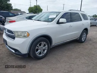 2011 Dodge Durango Crew with VIN 1D4RD4GG6BC730344, listed as a IAAI auction lot 42154714 with 211,903 mi miles and . Bid and sale history available at carsss.com. Image 2.