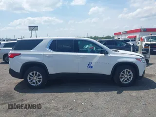2020 Chevrolet Traverse LS z VIN 1GNERFKW8LJ262886, wystawiony jako IAAI lot #42124771 z przebiegiem 22 357 mil mil oraz . Historia ofert i sprzedaży dostępna na DreamBid. Obrazek 13.