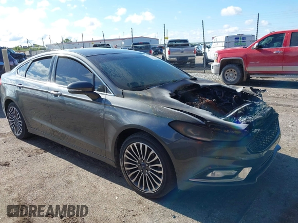 2017 Ford Fusion Titanium with VIN 3FA6P0K98HR124035, listed as a IAAI auction lot 42307936 with Not provided miles and . Bid and sale history available at DreamBid. Image 1.