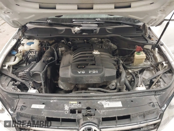 2013 Volkswagen Touareg Lux with VIN WVGEF9BP5DD011511, listed as a IAAI auction lot 41608840 with 167,350 mi miles and . Bid and sale history available at DreamBid. Image 10.