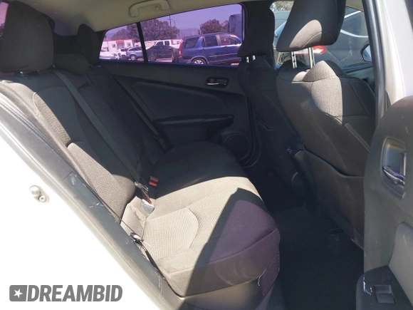 2021 Toyota Prius L Eco with VIN JTDKAMFU8M3135142, listed as a IAAI auction lot 42317007 with 77,353 mi miles and . Bid and sale history available at DreamBid. Image 8.