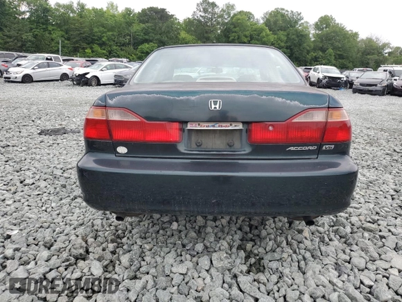 2000 Honda Accord EX z VIN 1HGCG1659YA073599, wystawiony jako Copart lot #58899565 z przebiegiem 389 828 mil mil oraz Szkoda całkowita • Salvage title. Historia ofert i sprzedaży dostępna na DreamBid. Obrazek 6.