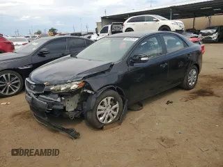 2010 Kia Forte EX with VIN KNAFU4A21A5244232, listed as a Copart auction lot 66602574 with 117,296 mi miles and Salvage Title. Bid and sale history available at carsss.com. Image 1.