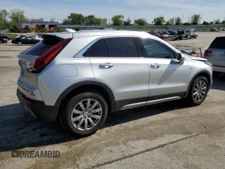 2019 Cadillac XT4 FWD Premium Luxury z VIN 1GYFZCR4XKF224734, wystawiony jako Copart lot #54141975 z przebiegiem 87 633 mil mil oraz Szkody całkowita. Historia ofert i sprzedaży dostępna na DreamBid. Obrazek 3.