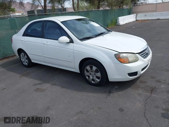 2009 Kia Spectra EX with VIN KNAFE221795630995, listed as a IAAI auction lot 41928252 with 126,694 mi miles. Bid and sale history available at carsss.com. Image 1.