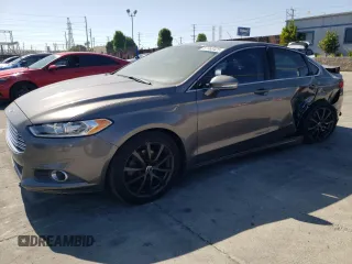 2013 Ford Fusion SE Hybrid z VIN 3FA6P0LUXDR362711, wystawiony jako Copart lot #57060425 z przebiegiem 155 031 mil mil oraz Szkoda całkowita • Salvage title. Historia ofert i sprzedaży dostępna na DreamBid. Obrazek 1.