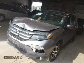 2016 Honda Pilot EX-L with VIN 5FNYF6H51GB097323, listed as a IAAI auction lot 41989978 with 105,006 mi miles. Bid and sale history available at carsss.com. Image 2.