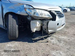 2007 Toyota Camry LE z VIN JTNBK46K473003622, wystawiony jako IAAI lot #42286264 z przebiegiem 105 630 mil mil oraz . Historia ofert i sprzedaży dostępna na DreamBid. Obrazek 6.