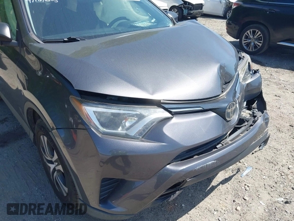 2016 Toyota RAV4 LE with VIN JTMZFREV7GJ086149, listed as a IAAI auction lot 42064251 with 90,104 mi miles and . Bid and sale history available at DreamBid. Image 17.