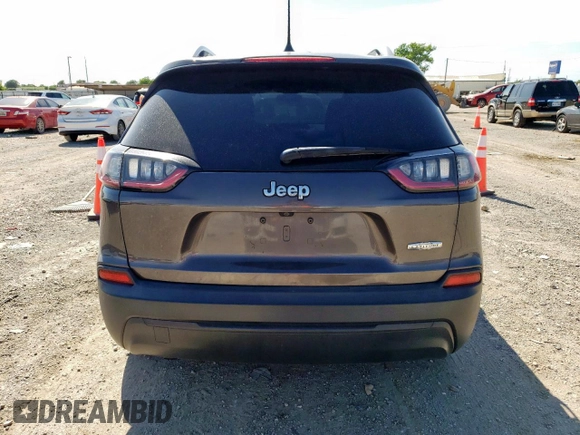 2019 Jeep Cherokee Altitude with VIN 1C4PJLLB3KD184565, listed as a Copart auction lot 58046345 with 91,618 mi miles and Salvage title. Bid and sale history available at DreamBid. Image 6.