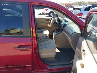 2009 Kia Sedona LX with VIN KNDMB233296307113, listed as a IAAI auction lot 41696813 with 121,722 mi miles. Bid and sale history available at carsss.com. Image 5.