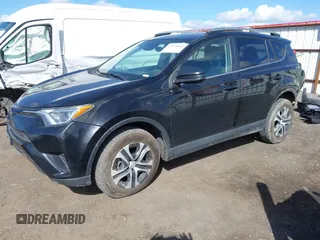2018 Toyota RAV4 LE with VIN 2T3BFREV2JW749735, listed as a IAAI auction lot 41998068 with 112,468 mi miles. Bid and sale history available at carsss.com. Image 18.