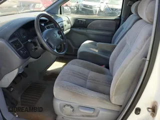 2000 Toyota Sienna LE with VIN 4T3ZF13C8YU252345, listed as a Copart auction lot 75563984 with 157,083 mi miles and Salvage Title. Bid and sale history available at carsss.com. Image 7.