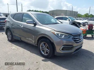 2017 Hyundai Santa Fe 2.4L with VIN 5XYZTDLB9HG419442, listed as a IAAI auction lot 42552392 with 143,076 mi miles and . Bid and sale history available at DreamBid. Image 1.