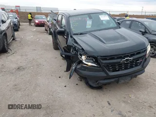 2018 Chevrolet Colorado 4WD ZR2 with VIN 1GCGTEENXJ1164617, listed as a IAAI auction lot 41354074 with 61,155 mi miles. Bid and sale history available at carsss.com. Image 1.