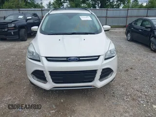 2016 Ford Escape Titanium z VIN 1FMCU9J90GUC76504, wystawiony jako IAAI lot #42552851 z przebiegiem 89 570 mil mil oraz . Historia ofert i sprzedaży dostępna na DreamBid. Obrazek 12.