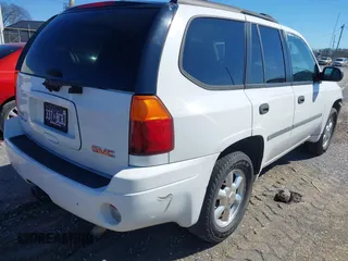 2007 GMC Envoy SLE with VIN 1GKDS13S772142847, listed as a IAAI auction lot 41605904 with 131,564 mi miles. Bid and sale history available at carsss.com. Image 4.