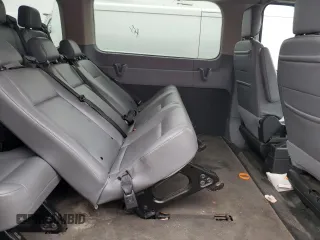 2018 Ford Transit Passenger XL z VIN 1FBZX2YM3JKA35423, wystawiony jako Copart lot #80974234 z przebiegiem Nie podano mil oraz Szkoda całkowita • Salvage title. Historia ofert i sprzedaży dostępna na DreamBid. Obrazek 11.