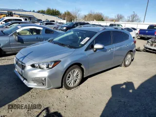 2018 Subaru Impreza Premium with VIN 4S3GTAB60J3737955, listed as a Copart auction lot 41518995 with 148,374 mi miles and Salvage Title. Bid and sale history available at carsss.com. Image 1.