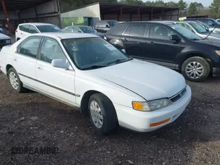 1996 Honda Accord with VIN 1HGCE664XTA021305, listed as a IAAI auction lot 41600685 with 151,320 mi miles and . Bid and sale history available at DreamBid. Image 1.