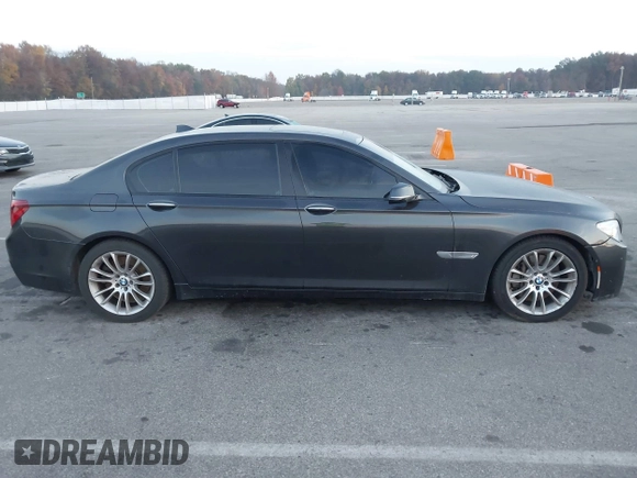 2014 BMW 7 Series ALPINA B7 with VIN WBAYE8C58ED136240, listed as a IAAI auction lot 40701912 with 116,246 mi miles. Bid and sale history available at carsss.com. Image 13.