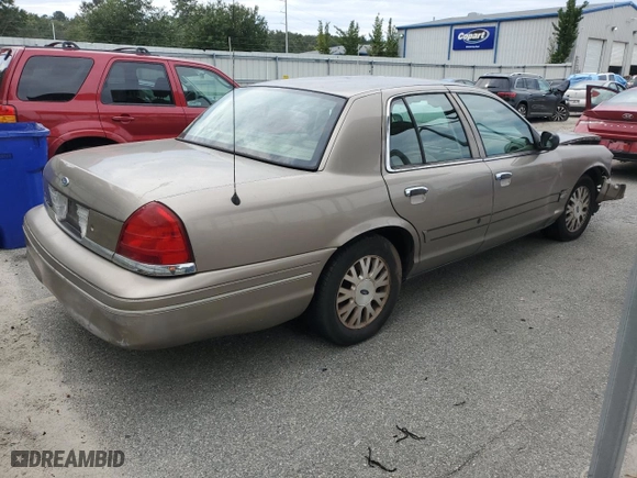 2005 Ford Crown Victoria LX with VIN 2FAFP74W95X126417, listed as a Copart auction lot 73537004 with 246,163 mi miles and Salvage Title. Bid and sale history available at carsss.com. Image 3.