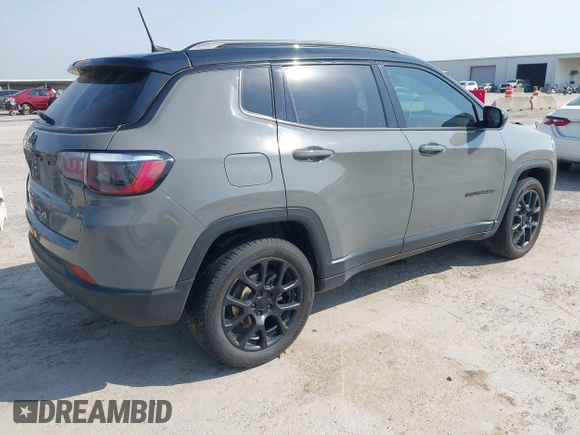2023 Jeep Compass Latitude with VIN 3C4NJDBN6PT531767, listed as a IAAI auction lot 42254833 with 57,630 mi miles and . Bid and sale history available at DreamBid. Image 4.