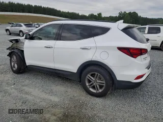 2018 Hyundai Santa Fe 2.4L z VIN 5NMZU3LB6JH104469, wystawiony jako Copart lot #57587495 z przebiegiem 78 267 mil mil oraz Szkoda całkowita • Salvage title. Historia ofert i sprzedaży dostępna na DreamBid. Obrazek 2.