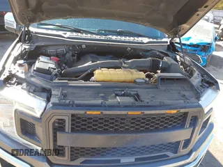 2018 Ford F-150 XL with VIN 1FTEW1EG2JKC51138, listed as a IAAI auction lot 41593411 with 149,324 mi miles. Bid and sale history available at carsss.com. Image 10.
