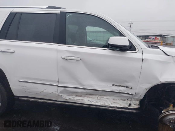 2018 GMC Yukon Denali with VIN 1GKS2CKJ8JR274087, listed as a IAAI auction lot 41097872 with 76,828 mi miles. Bid and sale history available at carsss.com. Image 6.