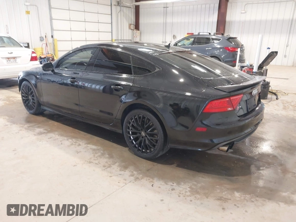 2015 Audi S7 with VIN WAUW2AFC0FN015327, listed as a IAAI auction lot 41964788 with 145,953 mi miles. Bid and sale history available at carsss.com. Image 3.